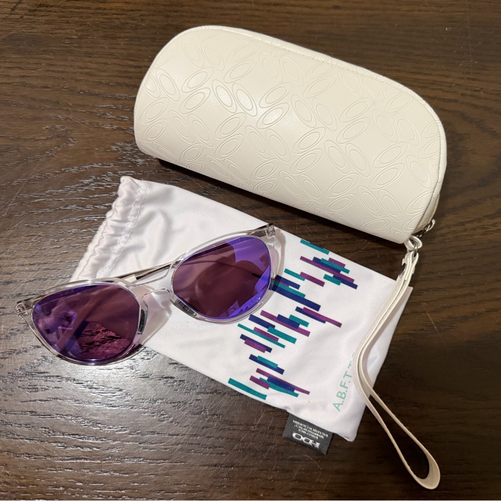 Oakley Clear Frame Sunglasses with Purple Lenses